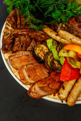 Assorted kebabs, Duck with fruit, Ribeye and Tibon steak, White Amur Koktal or rainbow trout, Baked leg of lamb