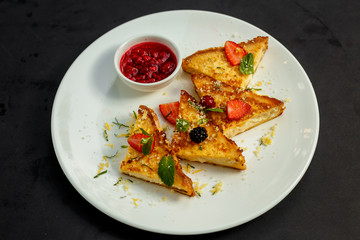 delicious toasts with cheese, fruit and raspberry jam, breakfast