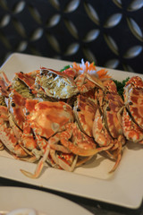 Seafood plate with crabs in a Vietnamese restaurant.