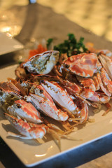Seafood plate with crabs in a restaurant