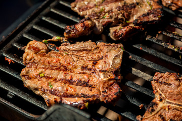 cooking grilled steaks