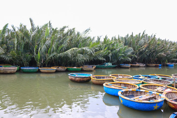 Naklejka na ściany i meble Traditional Vietnamese Basket Fishing Boats. Hoi An, Vietnam.