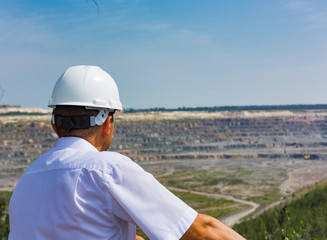 A mining engineer inspects huge granite quarries in Mikashevichy, Belarus. One of the largest quarries in the world, measuring 2 by 3 kilometers and a depth of 500 meters