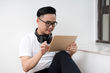 Home office scene of young Asian men