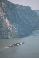 Danube, Romania commercial shipping with boats on the river