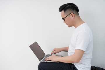 Home office scene of young Asian men