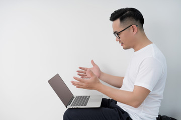 Home office scene of young Asian men