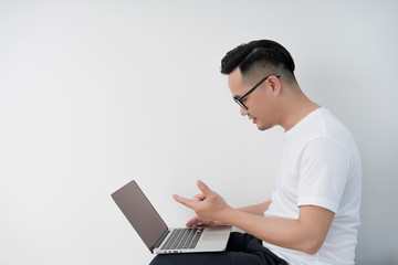 Home office scene of young Asian men