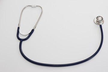 Fototapeta na wymiar Stethoscope isolated on white, top view. Medical tool