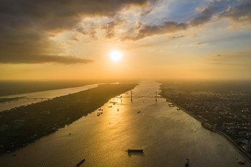 Aerial view of sunset over Mekong river, area of My Tho city, Tien Giang, Vietnam. Mekong Delta. Near Ben Tre