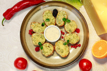 garlic bread with cheese and herbs on a white decorated table