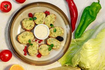 garlic bread with cheese and herbs on a white decorated table