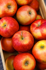 red apples in a wooden box, healthy food