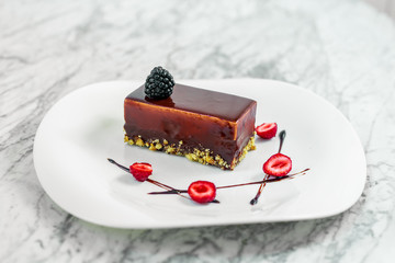 chocolate cheesecake with berries and nuts