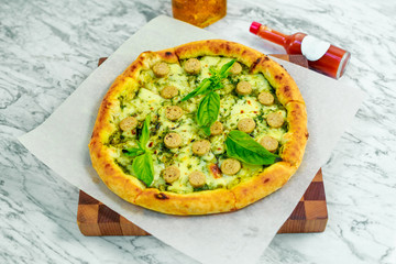 Italian pizza with mozzarella and basil