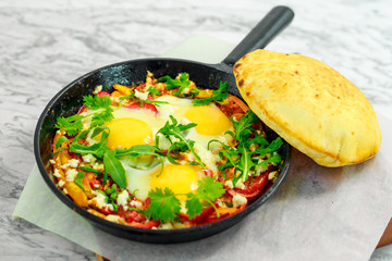 fried eggs with pepper in a pan, a beautiful serving