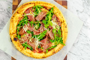 Italian pizza with mozzarella and basil