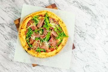 Italian pizza with mozzarella and basil