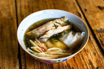 Banh cuon or banh cuon nuoc xuong vietnamese food in Cao Bang province, Vietnam. Near Ban Gioc waterfall. Vietnamese steamed rice noodle rolls