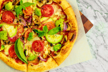 Italian pizza with mozzarella and basil