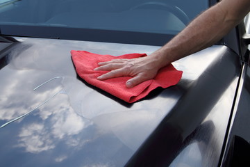polishing a car by hand