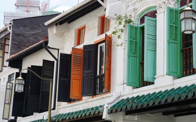 colorful wooden window shutters in singapore