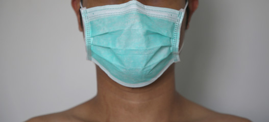 Doctor wearing protection face mask. protect corona virus. panorama Shoot.