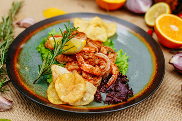 Autumn table setting with pumpkins. Thanksgiving dinner. beer shrimp with homemade potato chips