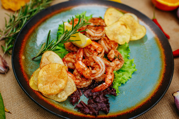 Autumn table setting with pumpkins. Thanksgiving dinner. beer shrimp with homemade potato chips