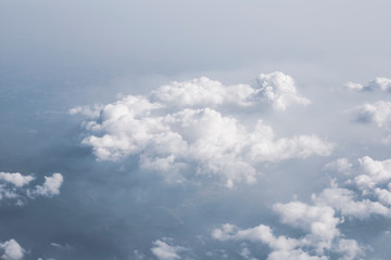 Cloudscape background scenery over the sky, view from the plane.
