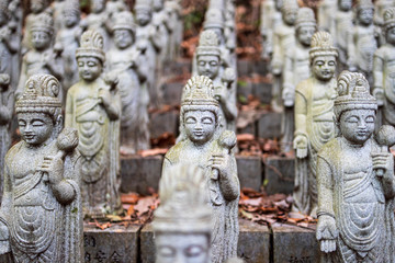 Rows of religious statues on stairs
