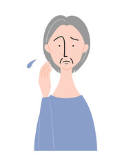 憂鬱な表情の年配女性／上半身