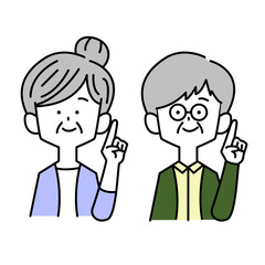 指差しする老夫婦