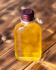 Yellow oil in a glass bottle