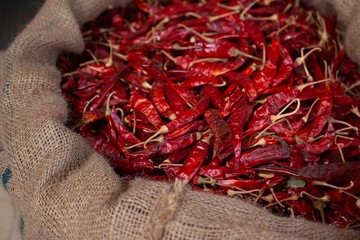 Red dry Chilli in huge bag on the market