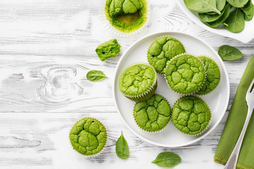 Vegan salty spinach muffins for healthy breakfast. - obrazy, fototapety, plakaty