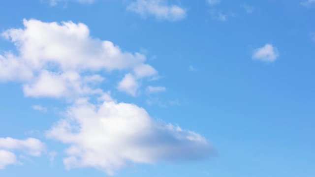 Beautiful clouds in the blue skyes on a sunny day 