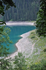 Fototapeta na wymiar Black lake in the Durmitor mountains near Zabljak. A beautiful place in Montenegro
