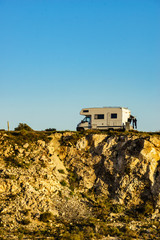 Fototapeta premium Camper camping on cliff rock, Spain