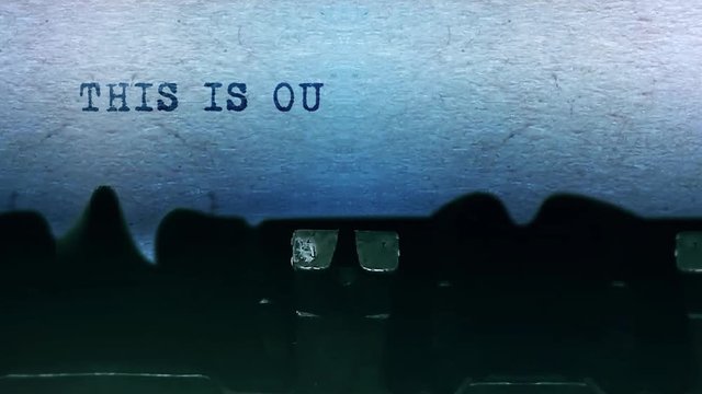 This is our story Word closeup Being Typing and Centered on a Sheet of paper on old vintage Typewriter mechanical 4k Footage Background Animation.