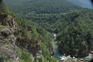 The bridge on the Tara River in Montenegro and the bridge connecting the two banks of the canyon. A...