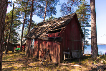 Fototapeta na wymiar Sweden on the island within the forest with sheds