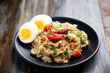 Northern Thai food (Tam Khanun), spicy pounded young jackfruit salad with boiled egg