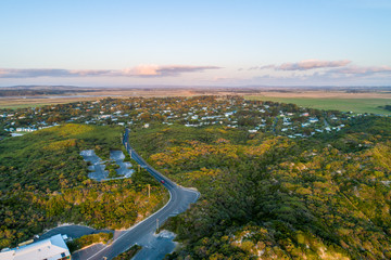 Surf drive road leading into Venus Bay township - aerial view