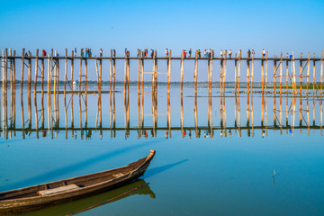 Fototapeta premium Royalty high quality free stock image of silhouettes of people and Bridge U-Bein teak bridge is the longest. in Amarapura ,Mandalay ,Myanmar