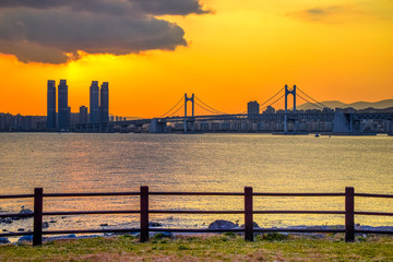 Gwangan Bridge and Haeundae at Sunset, Busan City, South Korea.