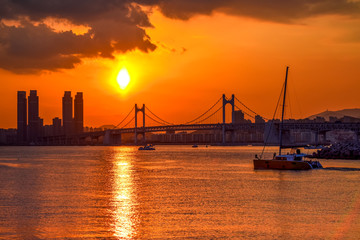 Fototapeta premium Gwangan Bridge and Haeundae at Sunset, Busan City, South Korea.
