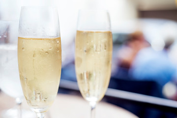 Close-up of cold champagne in champagne glasses.