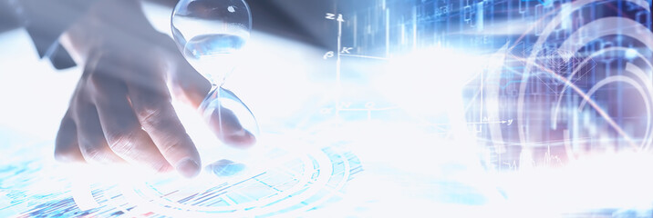 Business concept. Information technology and data processing. Hands over the screen with graphic data. A modern software product in business.