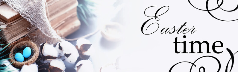 Bird's nest with eggs. Willow branches and first greens. Easter background. Palm Sunday. Christian holiday. Spring background.